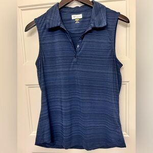 Navy blue women's greg norman sleeveless golf shirt
